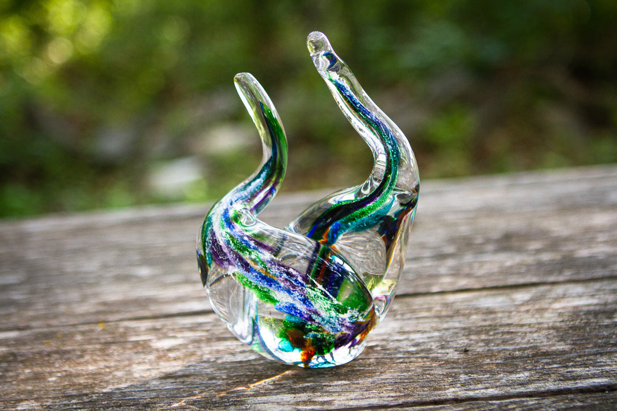 glass flame with cremation ash